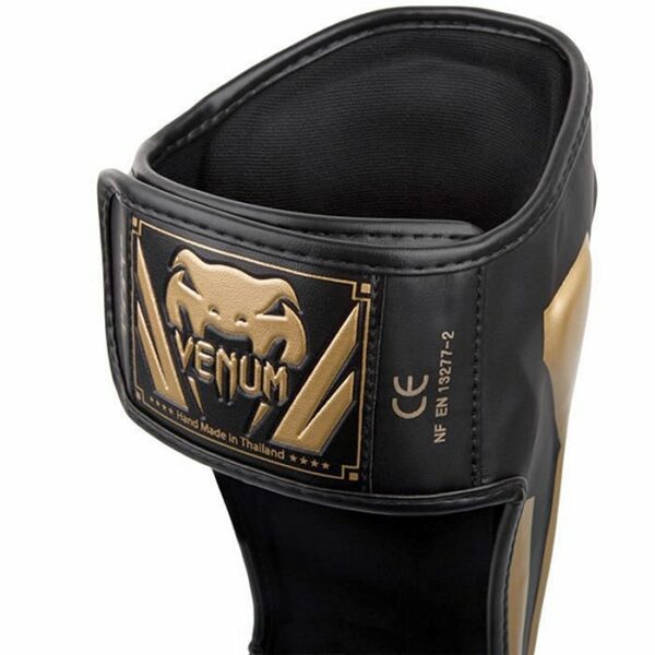 Venum Elite Standup Shinguards Negro-Oro ESPINILLERA - Imagen 3