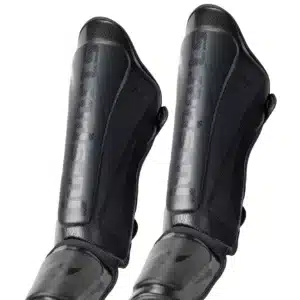 ESPINILLERAS MUAY THAI "ASSASIN" NEGRO JUSPORTS