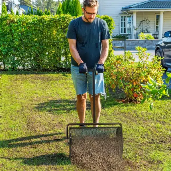 Esparcidor de Compost con Cesto de 75L Mango Ajustable y Diseño Resistente para Jardinería y Césped 70x40x112 cm Negro - Imagen 11